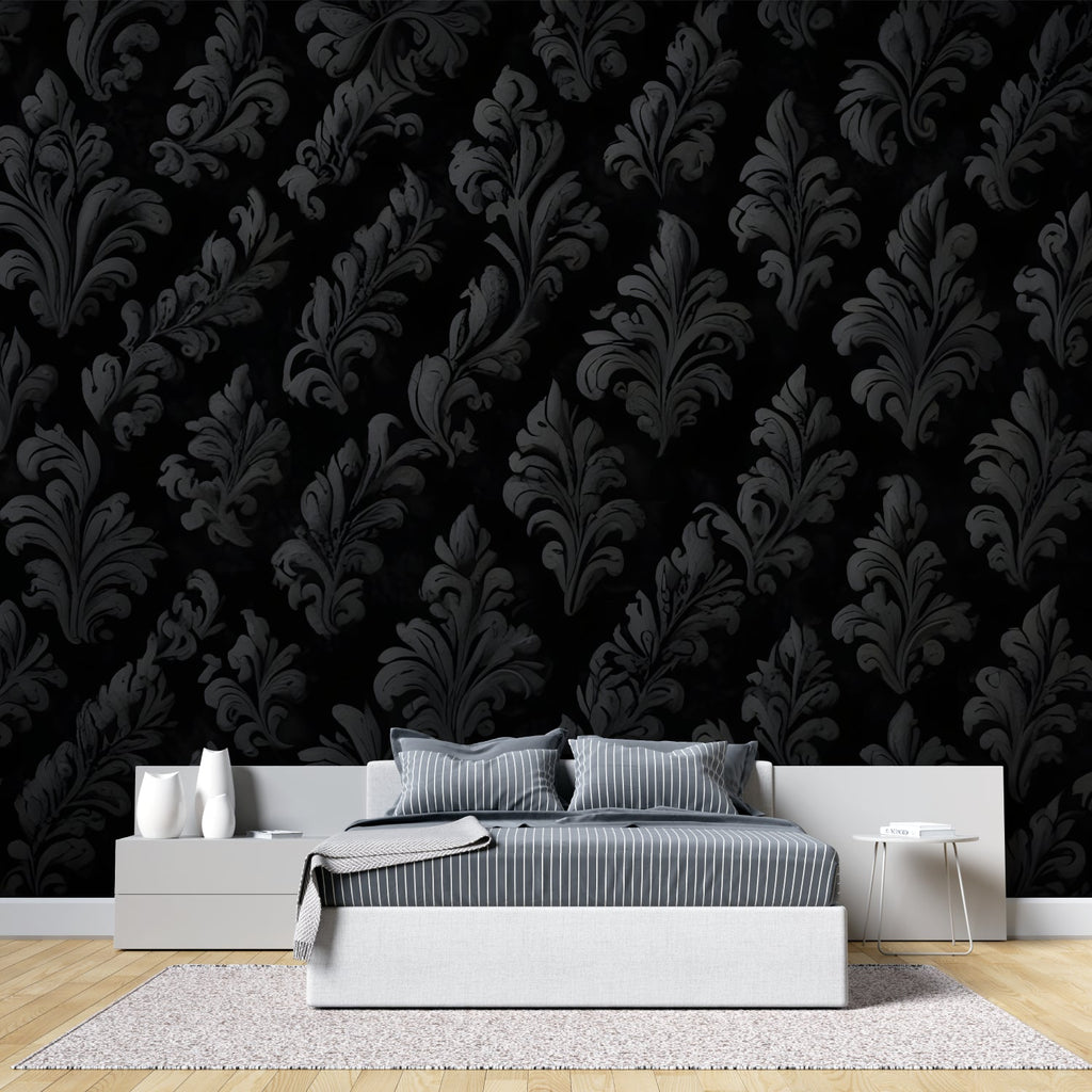 Elegant entryway with black damask pattern wallpaper and gold-framed mirror