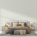 Grey damask wallpaper in an elegant living room setting with modern furniture and soft lighting