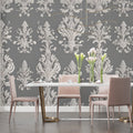 Grey and white Damask wallpaper mural in an elegant dining room with crystal chandelier