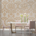 Gold Baroque wallpaper in modern living room with grey sofa and natural light