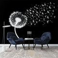 Black and white dandelion wallpaper creating dramatic impact in modern living room with grey sofa and minimal decor