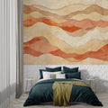 Desert waves wallpaper in modern minimalist living room with natural light showing terracotta tones