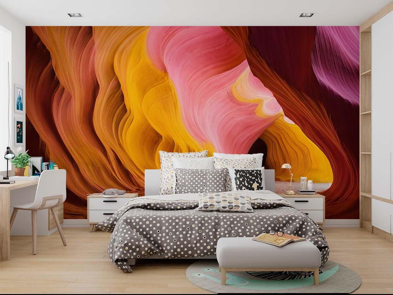 Pink desert canyon wallpaper in bedroom setting, soft lighting highlighting natural wave patterns