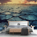 Desert landscape wallpaper creating depth in a modern living room, warm sunset tones complement contemporary furniture