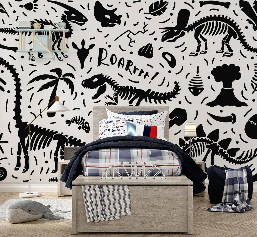 Black and white dinosaur skeleton wallpaper creating an educational atmosphere in a modern playroom