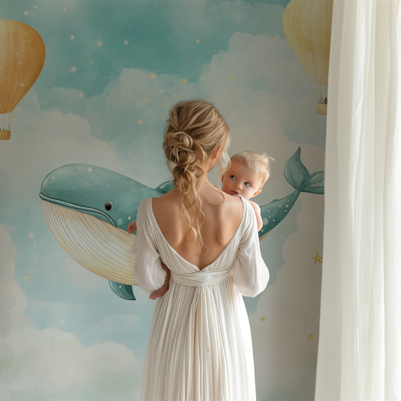 Baby room with dreamy whale wallpaper showing scale and full wall application