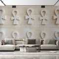 Egyptian wall mural with 3D Ankh pattern creating depth in a modern living room with neutral furniture