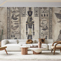 Egyptian hieroglyphs wallpaper creating an authentic ancient atmosphere in a modern living room with warm lighting