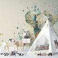 Baby elephant watercolor wallpaper creating a soft, dreamy atmosphere in a modern nursery with white furniture