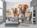 Elephant wallpaper mural in modern living room showing soft watercolor details and warm golden tones