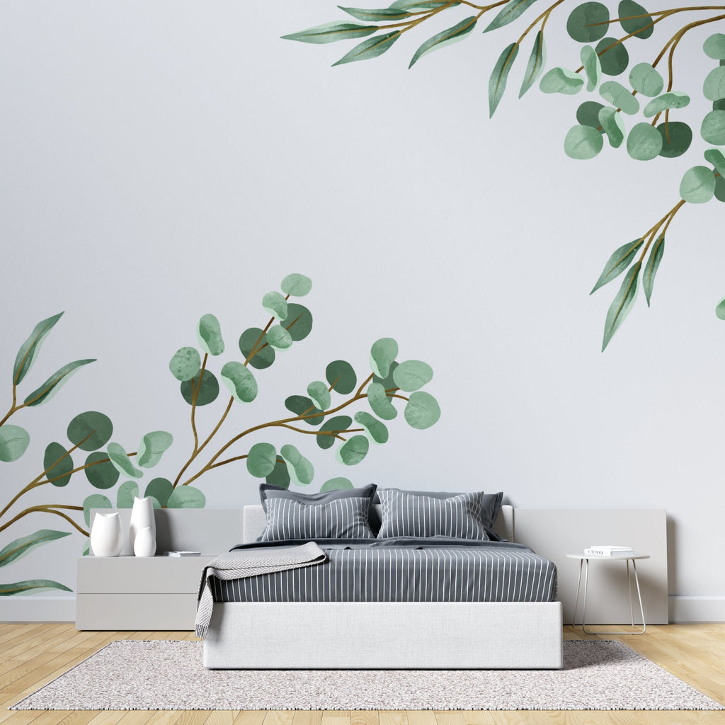 Dining room with botanical eucalyptus wallpaper showing scale and natural light interaction