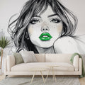 Fashion portrait wallpaper with green accent creating drama in a modern living room with minimalist furniture