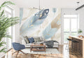 Blue and gold feather wallpaper in modern living room creating an airy, sophisticated atmosphere