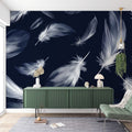 Navy and white Feather Wallpaper creating a serene atmosphere in a modern bedroom with minimal furniture