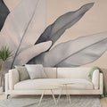 Modern grey and beige Feather Mural Wallpaper creating a peaceful atmosphere in a minimalist living room setting