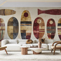 Modern geometric fish wallpaper creating a stunning focal point in a minimalist dining room with warm lighting