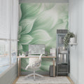 Abstract leaf wallpaper in bright modern living room showing flowing green pattern