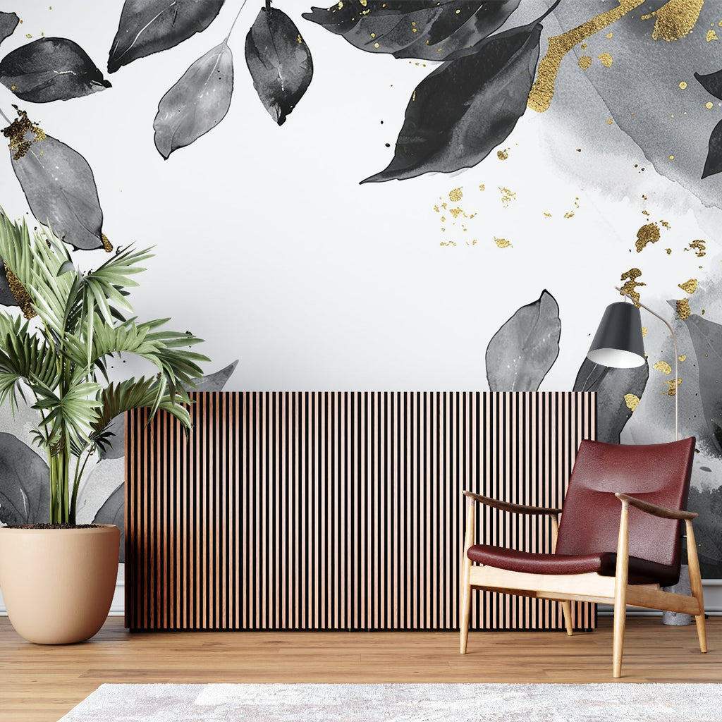 Black and gold leaf wallpaper in modern living room creating elegant atmosphere
