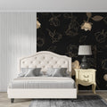 Black and gold rose wallpaper in modern dining room with crystal chandelier