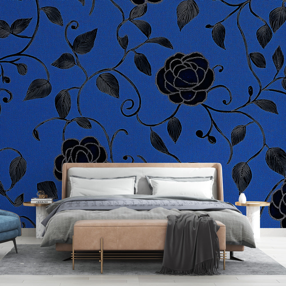 Black and royal blue rose wallpaper mural in a modern dining room creating an elegant atmosphere with dramatic lighting