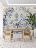 Blue toile de jouy wallpaper in elegant dining room with classic furniture and natural light