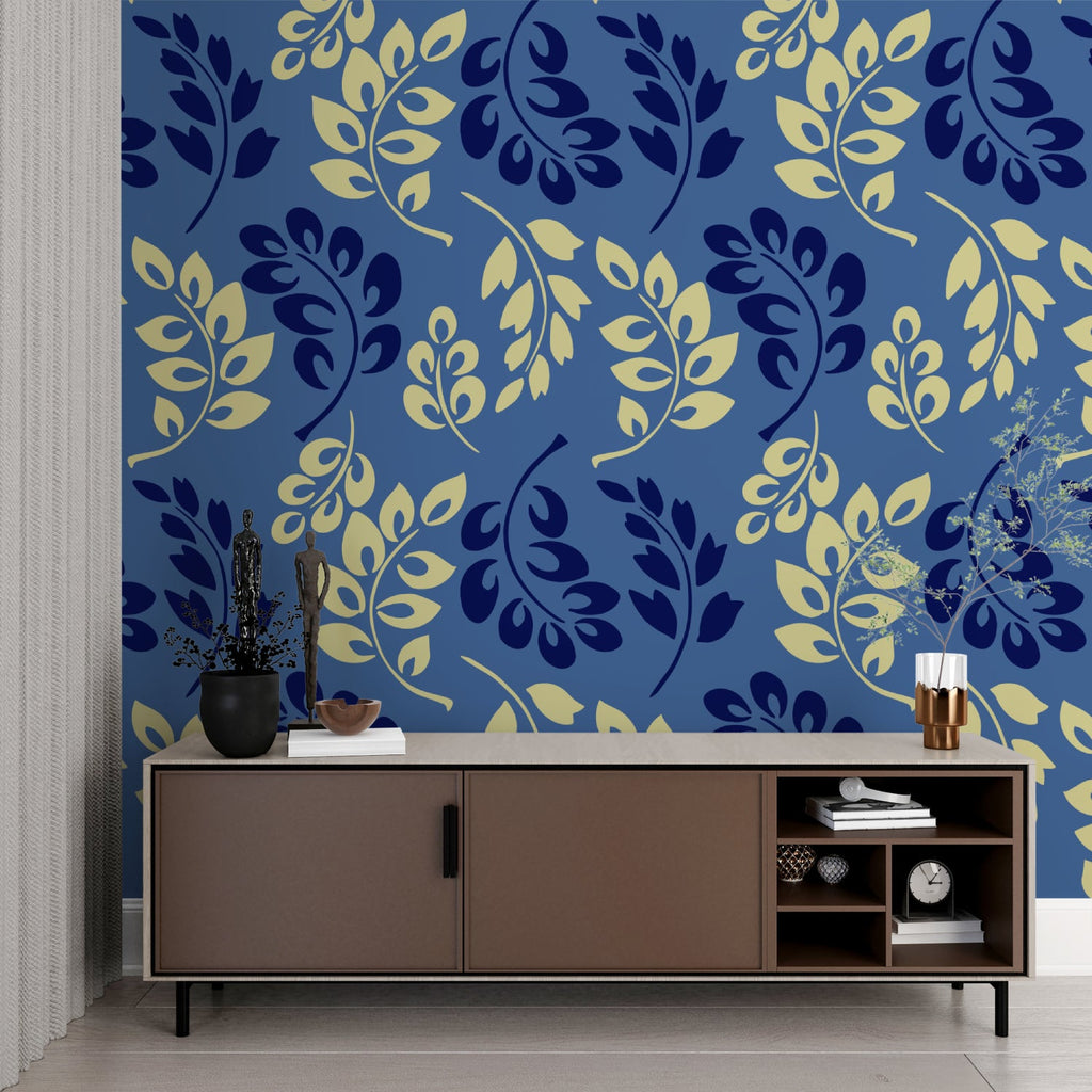 Blue and gold botanical wallpaper in home office with wooden desk