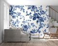 Blue and white chinoiserie wallpaper in bright living room with modern furniture