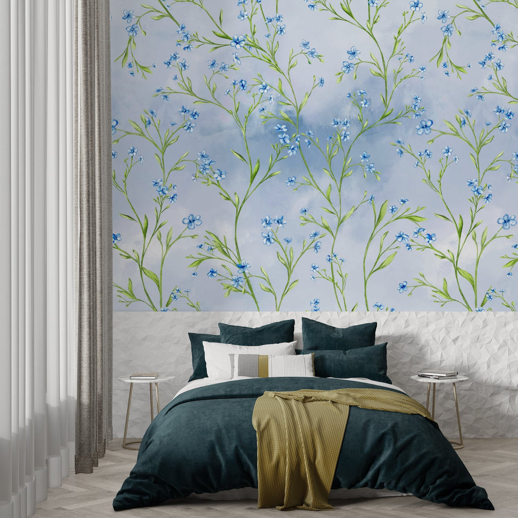 Blue floral wallpaper creating serene atmosphere in reading nook