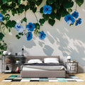 Blue Morning Glory floral wallpaper creating a fresh garden feel in a bright modern bedroom with natural light