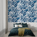 Blue Toile de Jouy wallpaper in bright modern living room showing elegant floral pattern