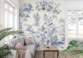 Blue and white Toile de Jouy wallpaper in a bright dining room with classic furniture and natural light