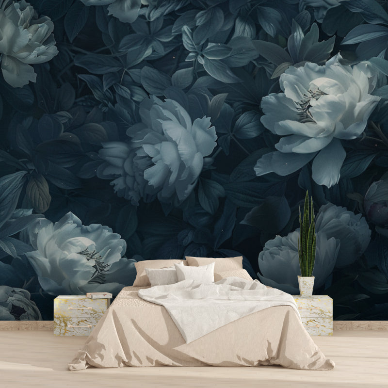 Blue floral mural installation in boutique entrance with pendant lights