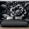 Black and white floral wallpaper creating drama in a modern living room with minimal furniture