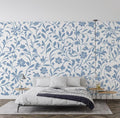 Blue and white floral pattern wallpaper creating a fresh look in a bright modern living room setting
