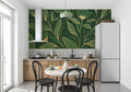 Luxurious green and gold botanical wallpaper creating a stunning backdrop in a modern living room setting