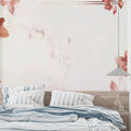 Modern terracotta floral wallpaper in bright living room with minimal furniture