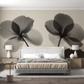 Monochrome Begonia X-ray floral wallpaper creating dramatic impact in a modern living room with clean lines and natural light