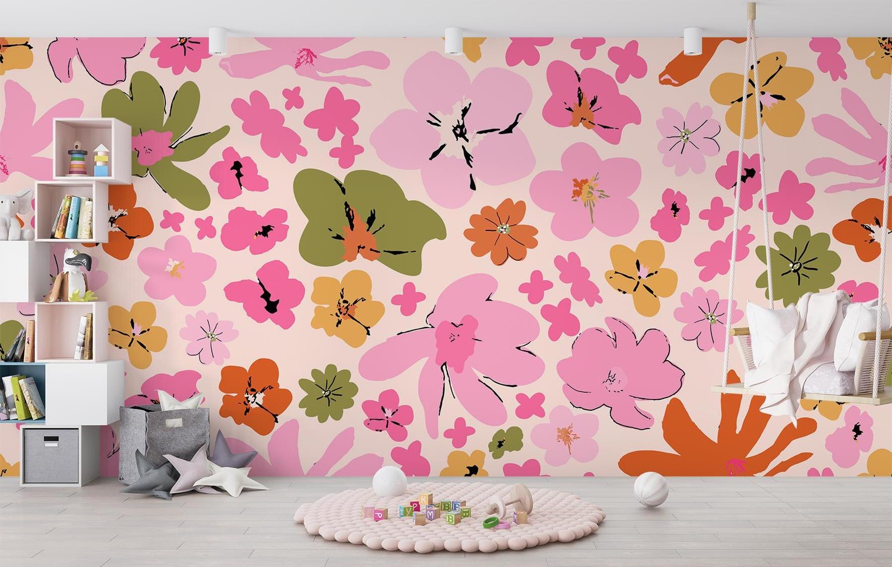 Pink and orange floral wallpaper mural in a bright modern living room, creating a cheerful accent wall