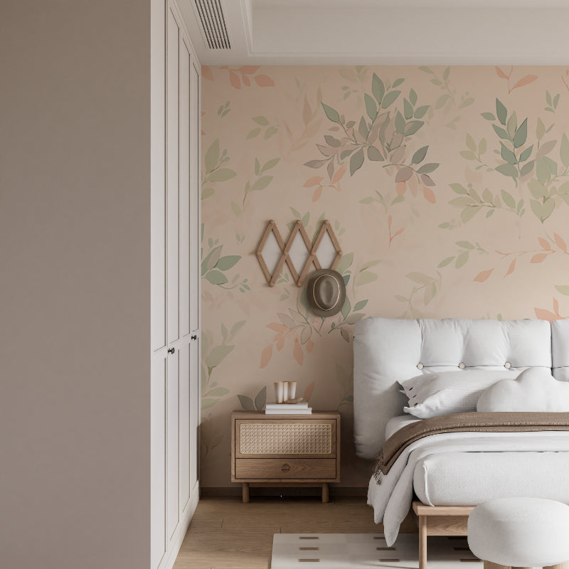 Pastel leaves wallpaper creating depth in a nursery with white furniture