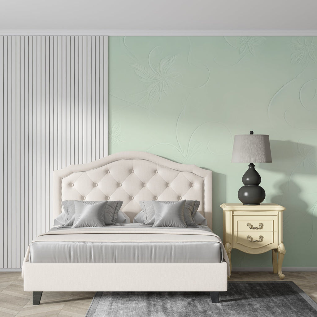 Subtle mint green pattern creating depth in an entryway