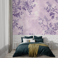Purple floral wallpaper bringing elegance to a modern living room with soft lighting