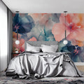 Watercolor floral wallpaper in modern living room showing pink and navy abstract petals creating depth