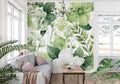 Green floral wallpaper creating a fresh look in modern living room with natural light
