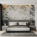 Watercolor leaf wallpaper creating a peaceful atmosphere in a modern living room with grey furniture