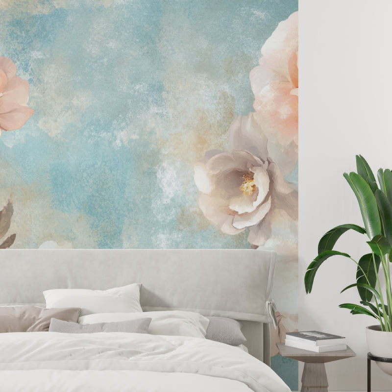 Rose mural wallpaper creating a soft backdrop in an elegant entrance hall