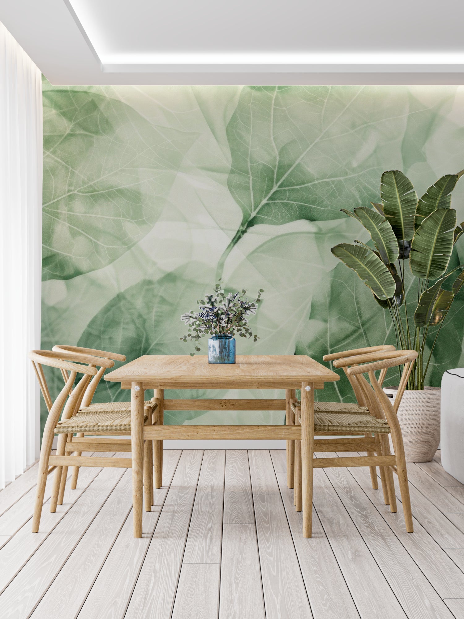 Green leaf mural wallpaper adding natural charm to a minimalist dining room setting