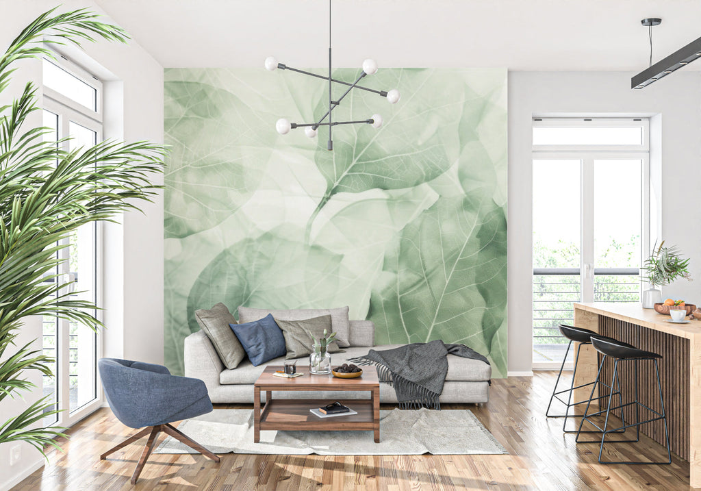 Ethereal green leaf wallpaper creating depth in an entrance hallway