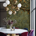 Luxury foliage wallpaper with golden leaves creating warmth in modern living room setting