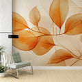 Orange leaf wallpaper mural in a bright modern living room, creating a warm and inviting atmosphere with natural light