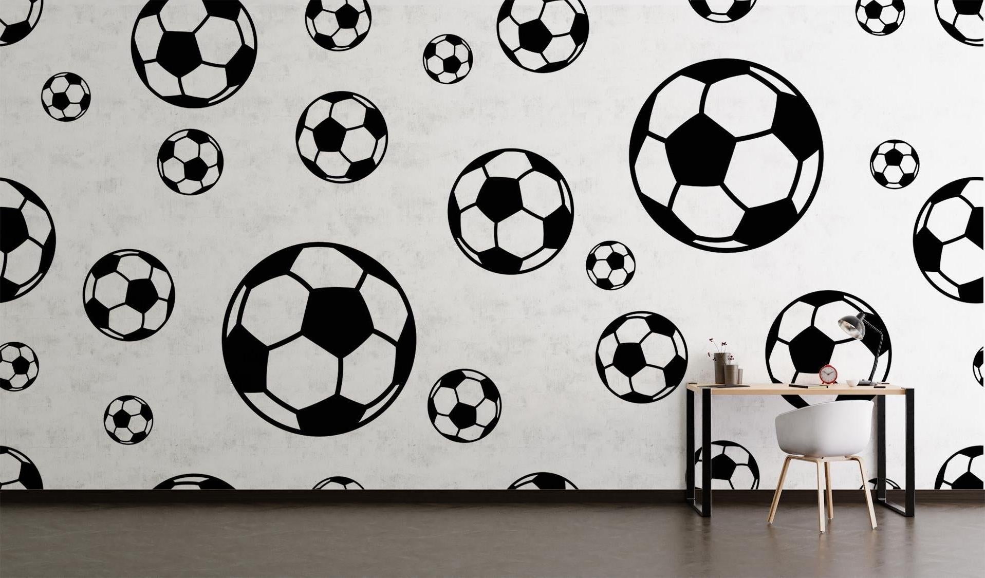 Football wallpaper mural in modern teen bedroom showing black and white soccer ball pattern creating depth